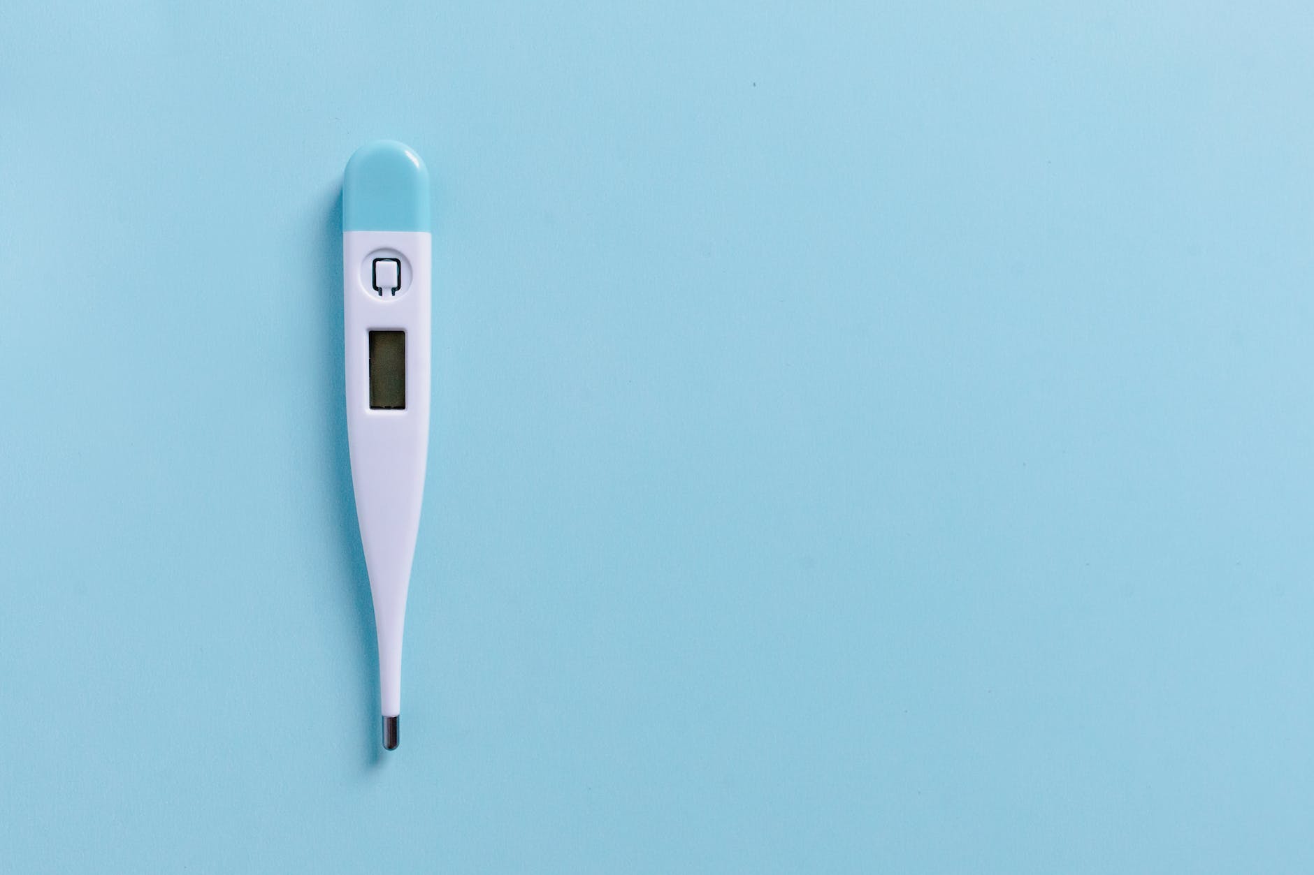 a white blue digital thermometer